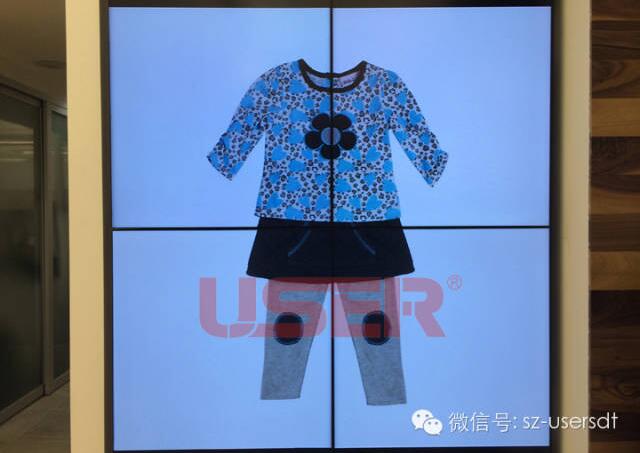 美國兒童時(shí)裝店2*2液晶拼接屏展示